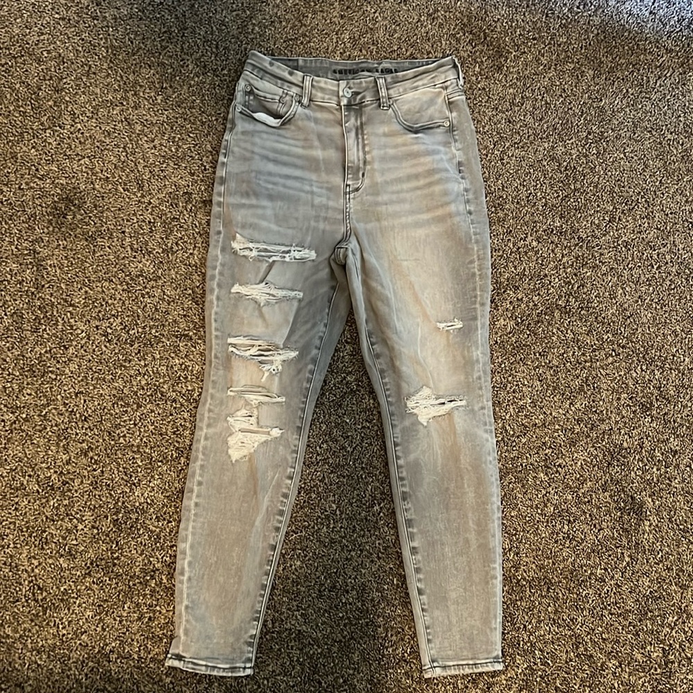 American Eagle Next Level Stretch Ripped Faded Grey Jeans